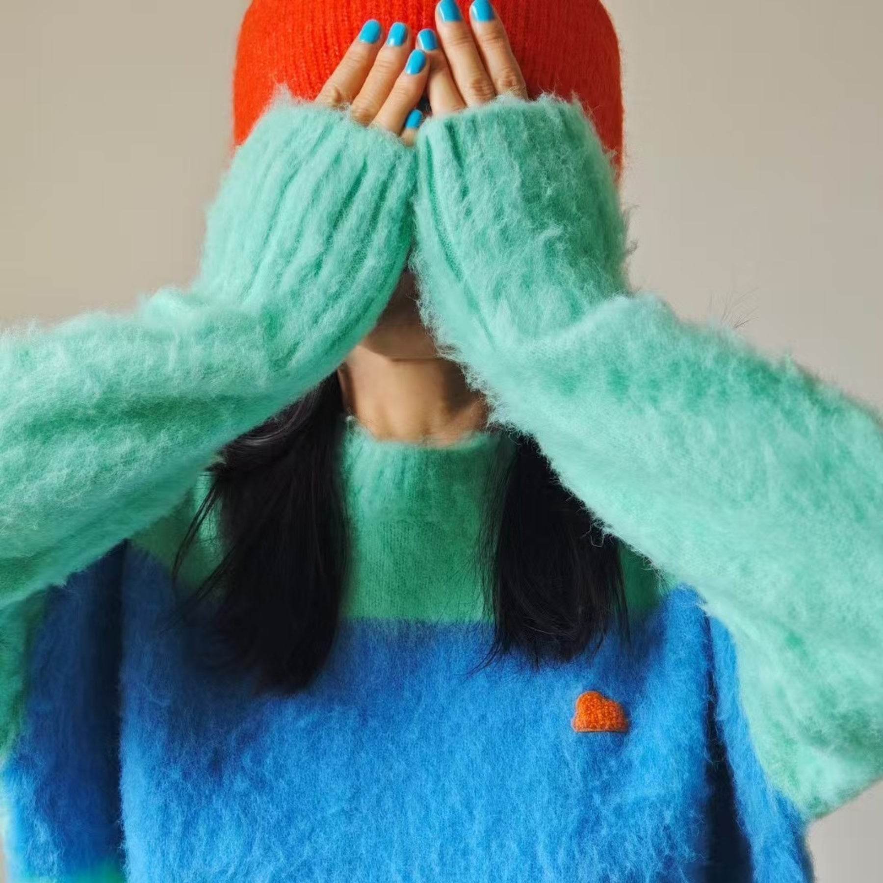 model-wearing-fuwa-fuwa-sweater-main-Blue-Green_Mix.jpg